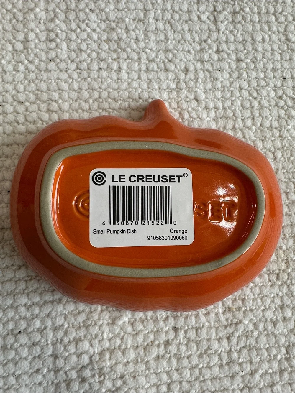 Le Creuset pumpkin-shaped small dish in Volcanic Orange glaze